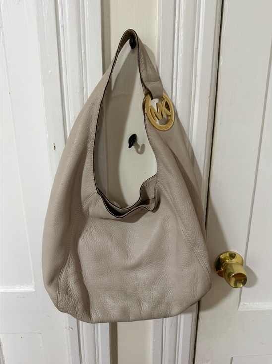 Michael Kors Handbags - Michael Kors Soft Pebbled Leather Hobo in Light Taupe with Gold Charm